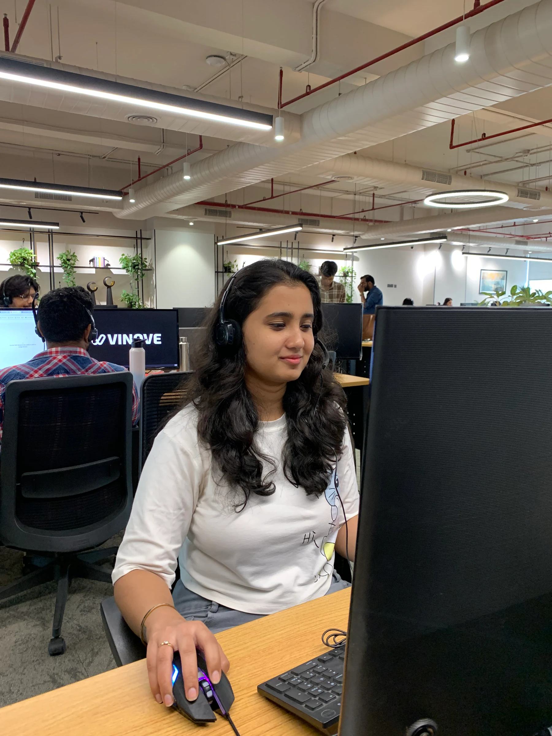 A Vinove colleague working in the Noida office